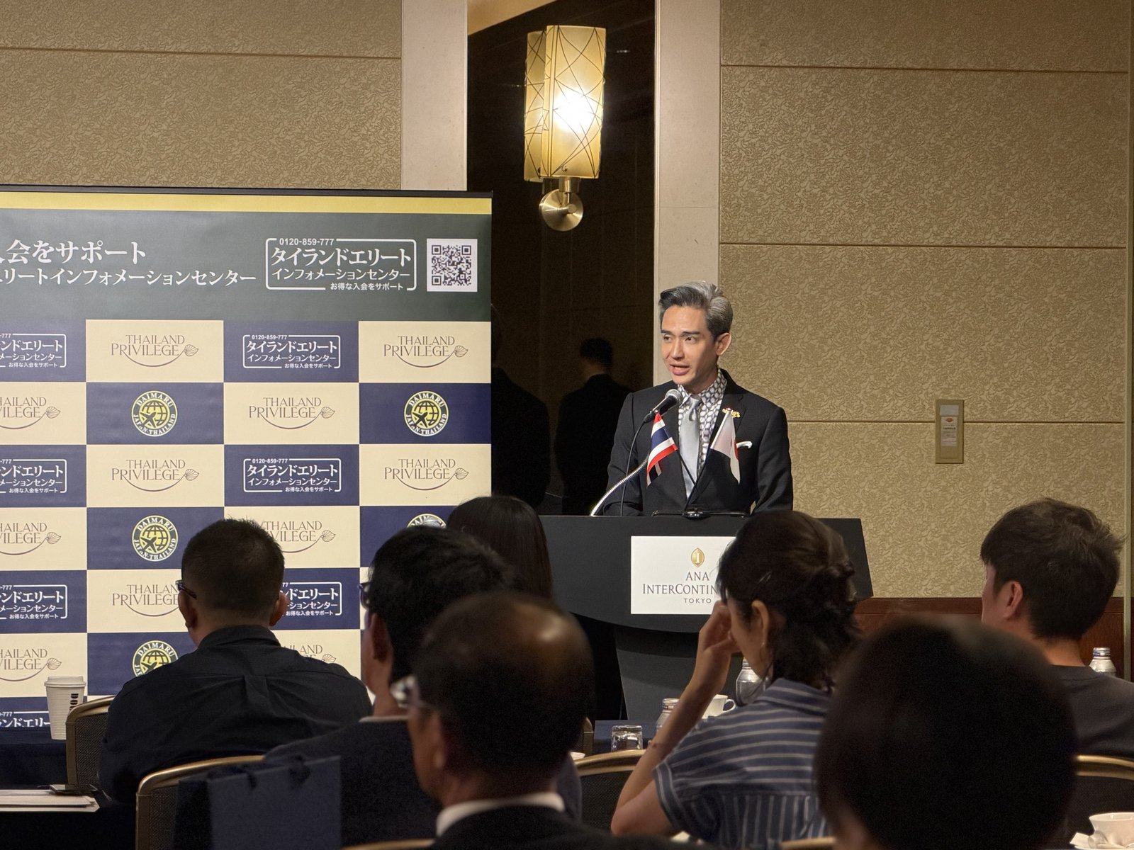 Kn. Manatase, President of Thailand Privilege Card Co., Ltd., delivering the opening address at the Japan Road Show 2026 Tokyo session, ANA InterContinental Tokyo, 30 May 2026