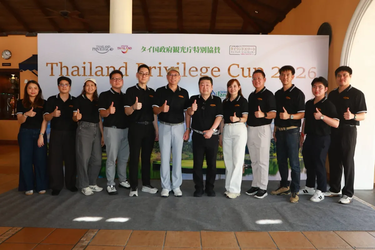 Organizing team of the Thailand Privilege Cup 2026 in front of the event backdrop at Amata Spring Country Club clubhouse